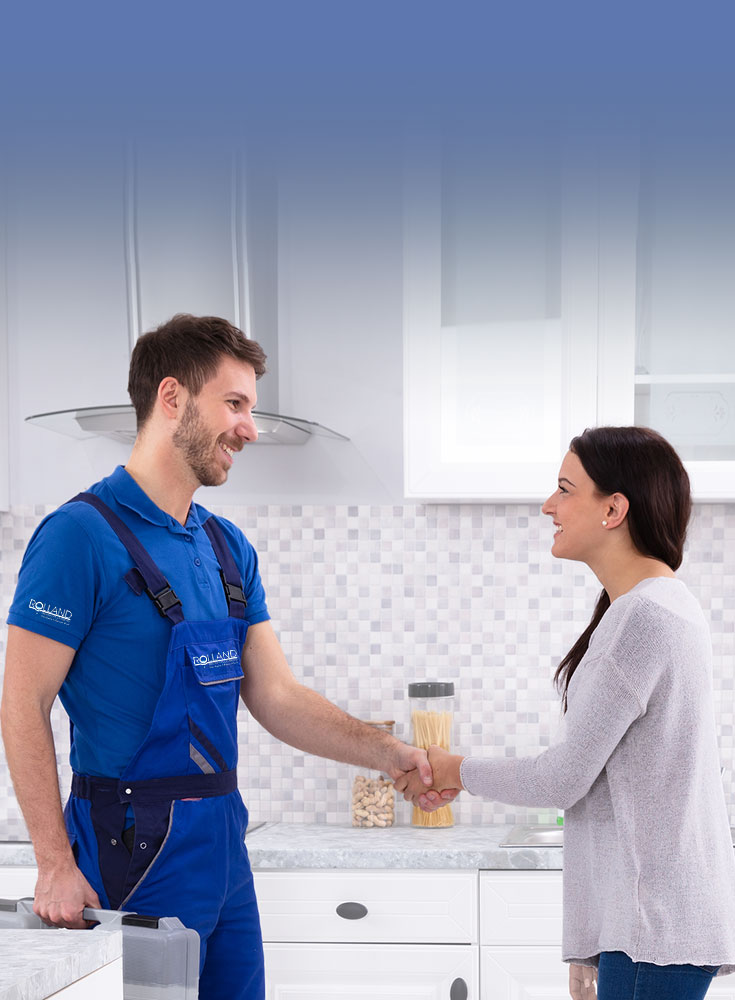 plumber with customer Rolland Reash Plumbing in Jacksonville, FL